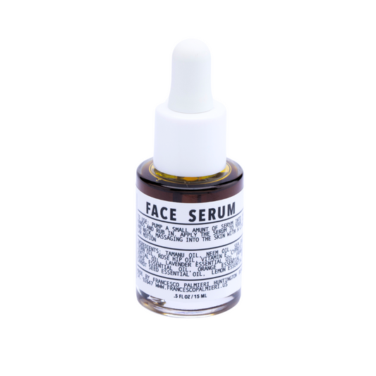 Repairative Face Serum bottle with organic Tamanu and Rosehip oils for hydrated skin