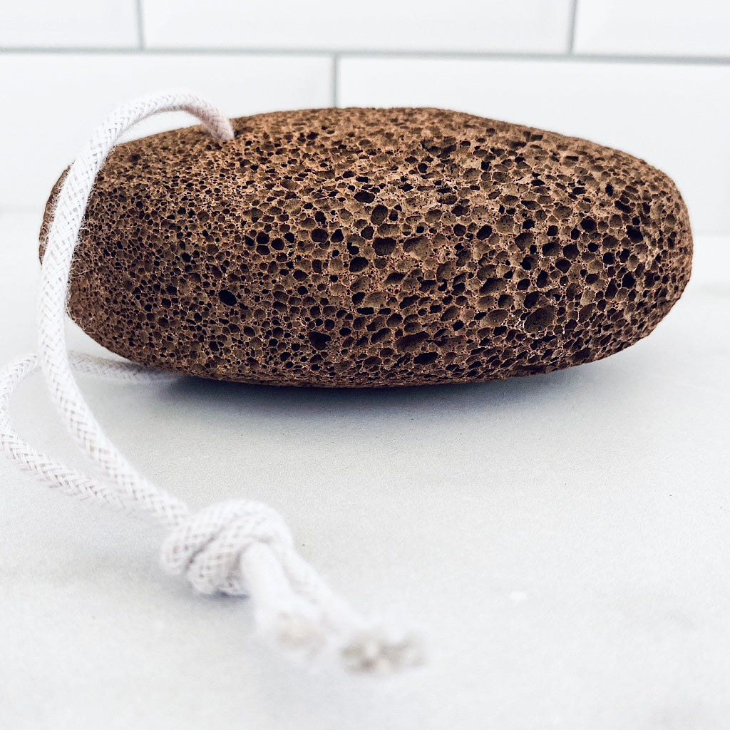 Natural lava stone with a porous texture, perfect for exfoliating rough skin